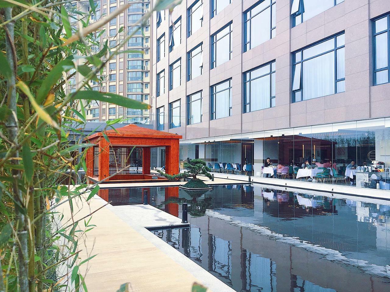 Virtuous World Hotel Foshan Esterno foto
