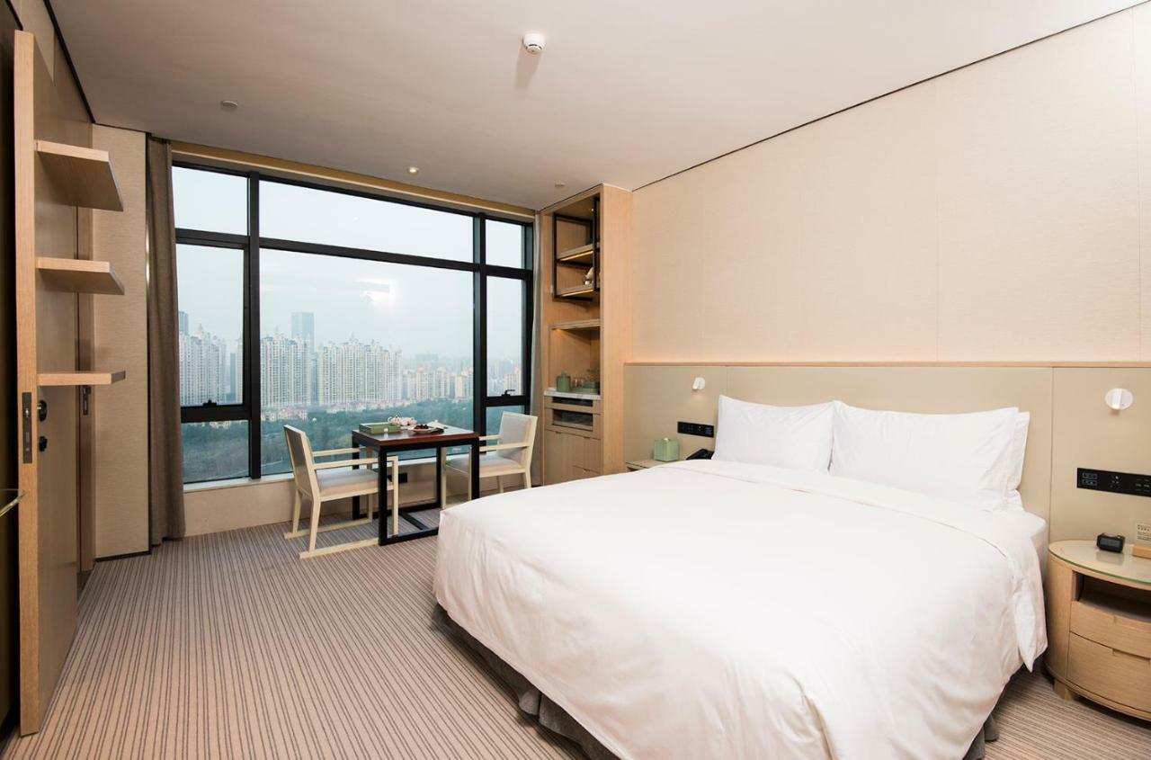 Virtuous World Hotel Foshan Esterno foto