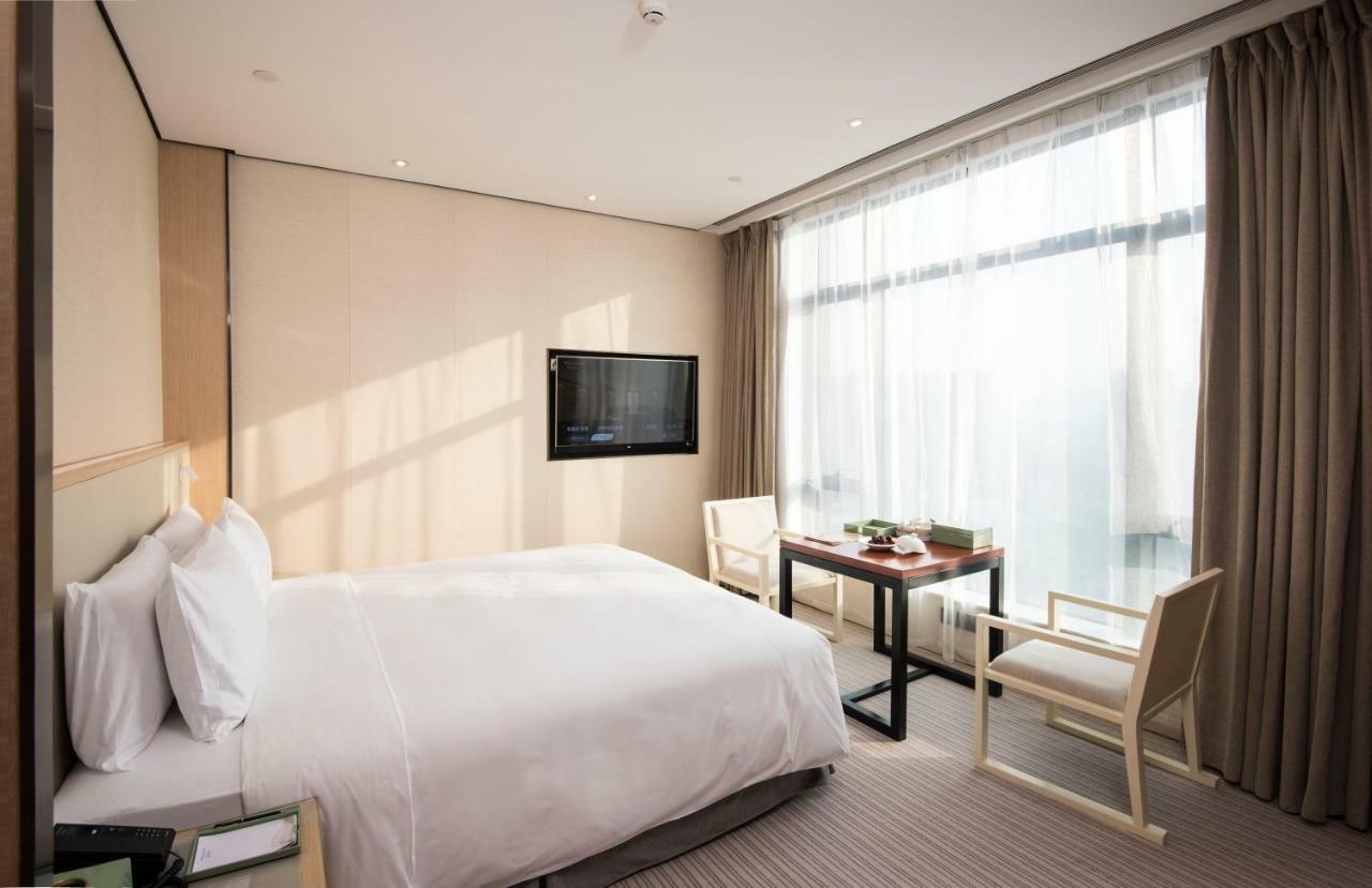 Virtuous World Hotel Foshan Esterno foto