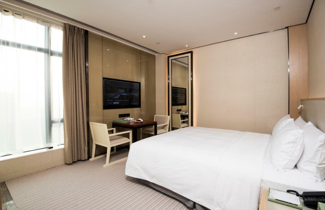 Virtuous World Hotel Foshan Esterno foto