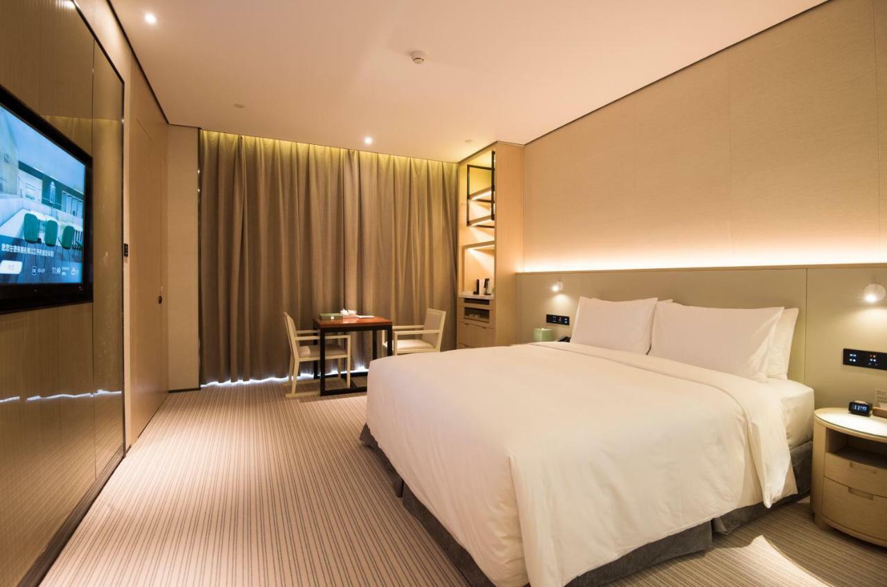 Virtuous World Hotel Foshan Esterno foto