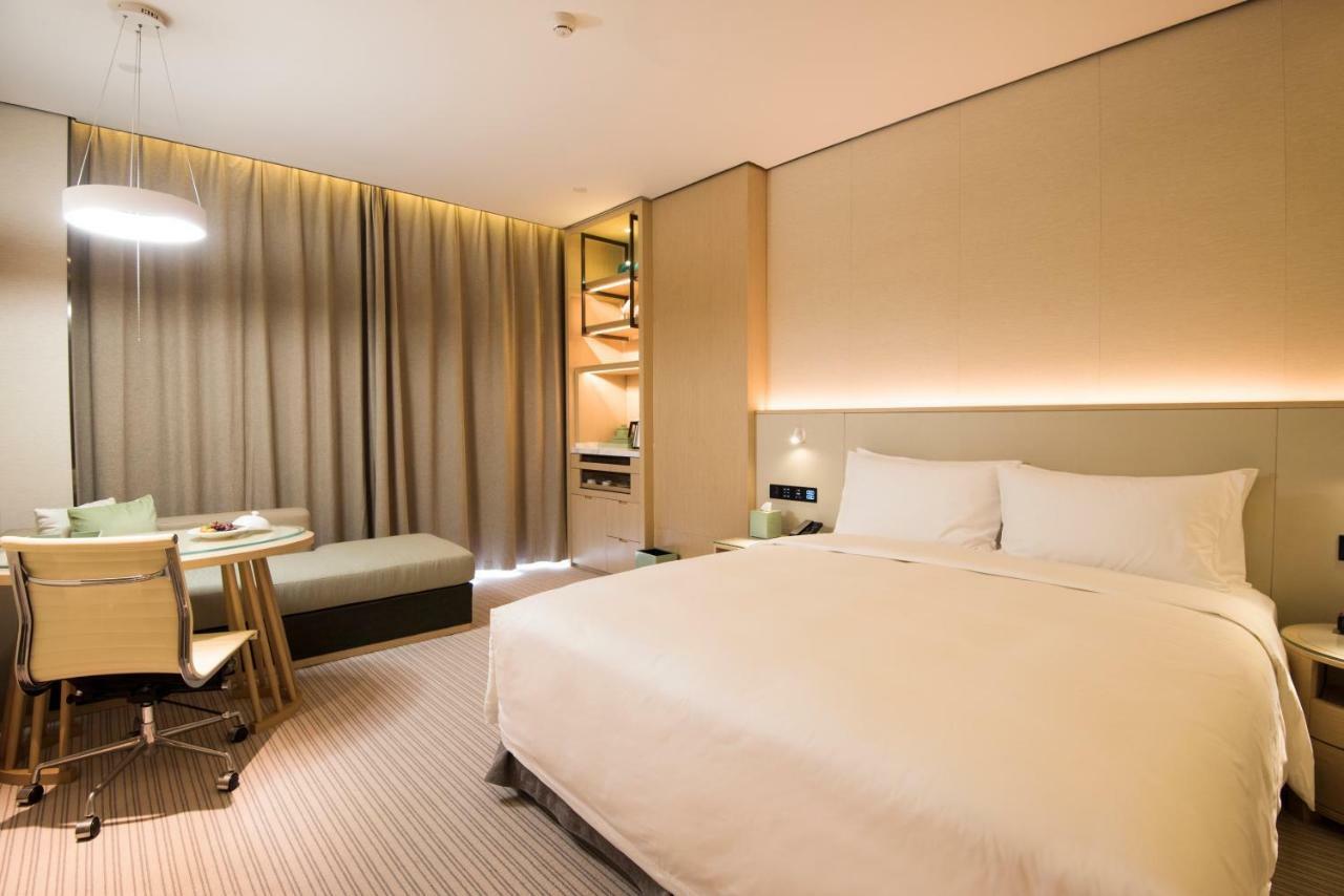 Virtuous World Hotel Foshan Esterno foto