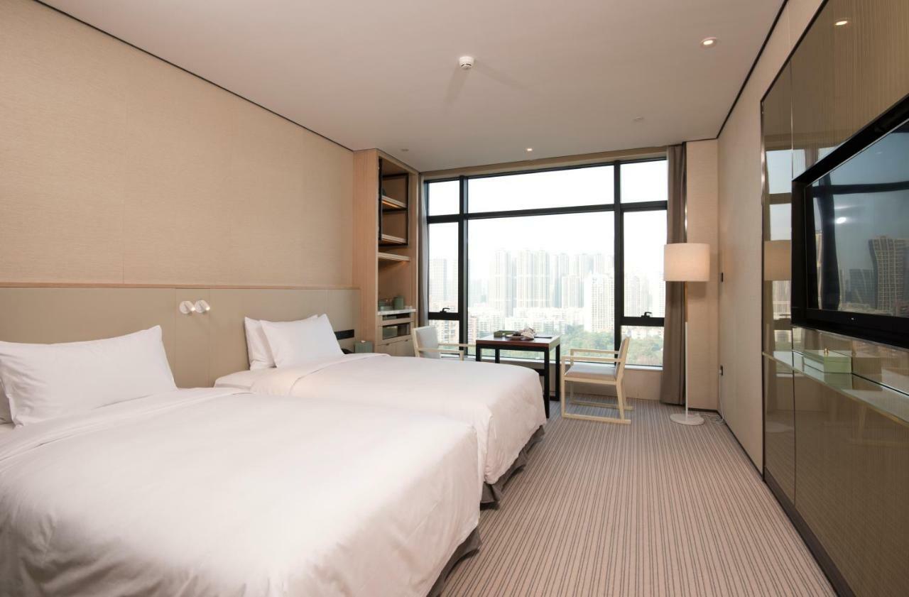 Virtuous World Hotel Foshan Esterno foto