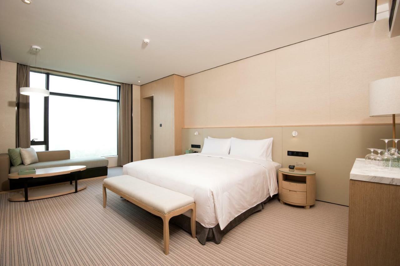 Virtuous World Hotel Foshan Esterno foto