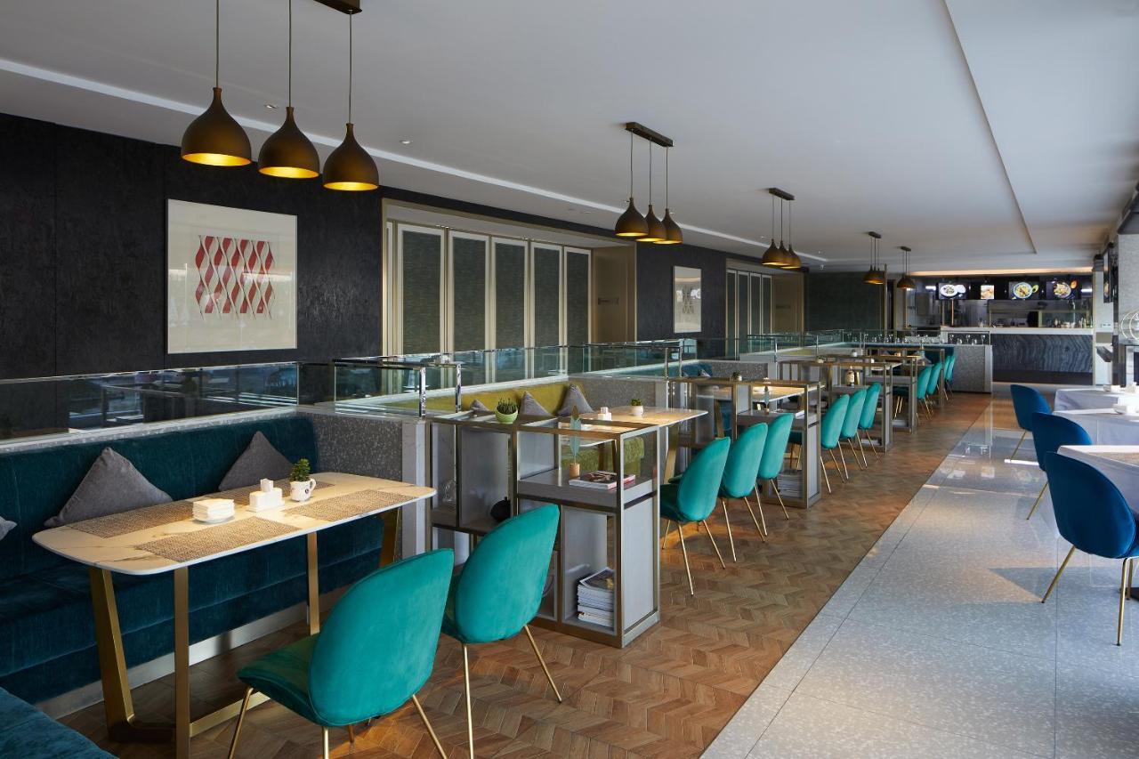Virtuous World Hotel Foshan Esterno foto